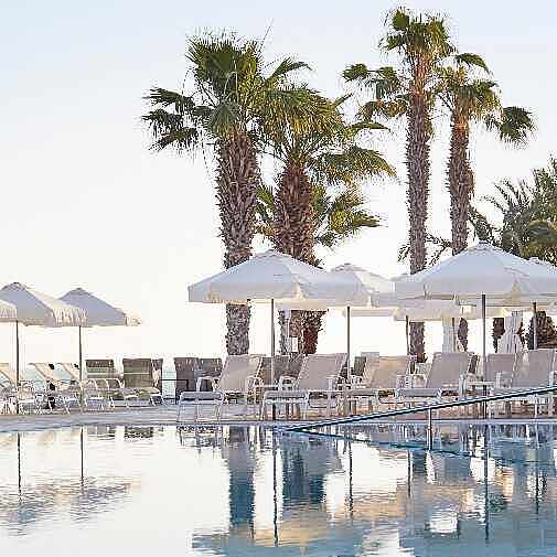 TUI BLUE Nausicaa Beach Pool outdoor TUI BLUE Nausicaa Beach Pool outdoor Palmen Schirme Liegen